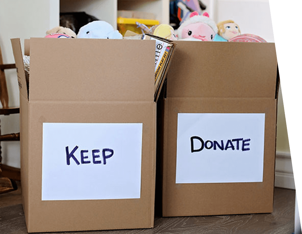 Two boxes with keep and donate written on them