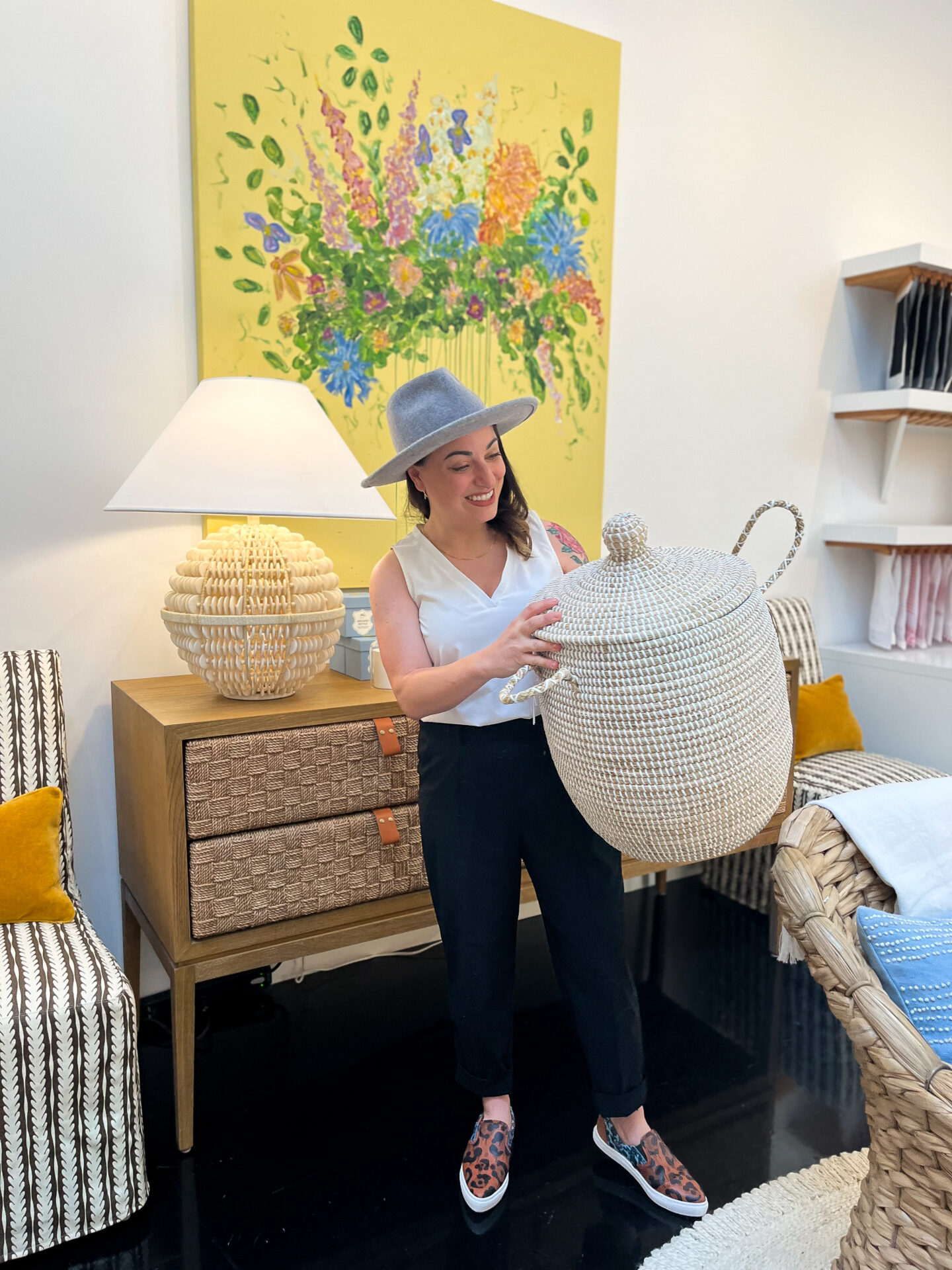 A woman holding a basket in her hand.